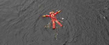 Midnight Sun Floating Experience In Forest Lake (Finland)